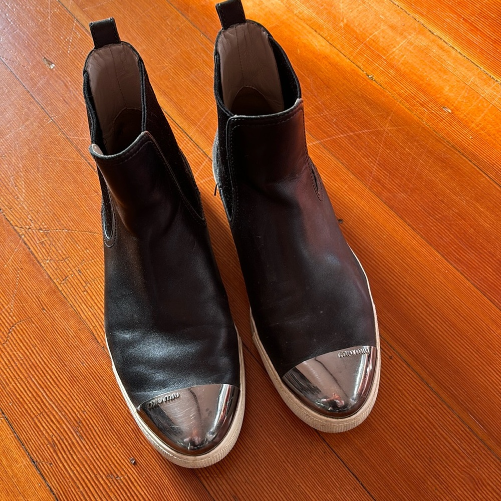 Miu Miu leather boots with metal toes. Size 37. used and well loved.